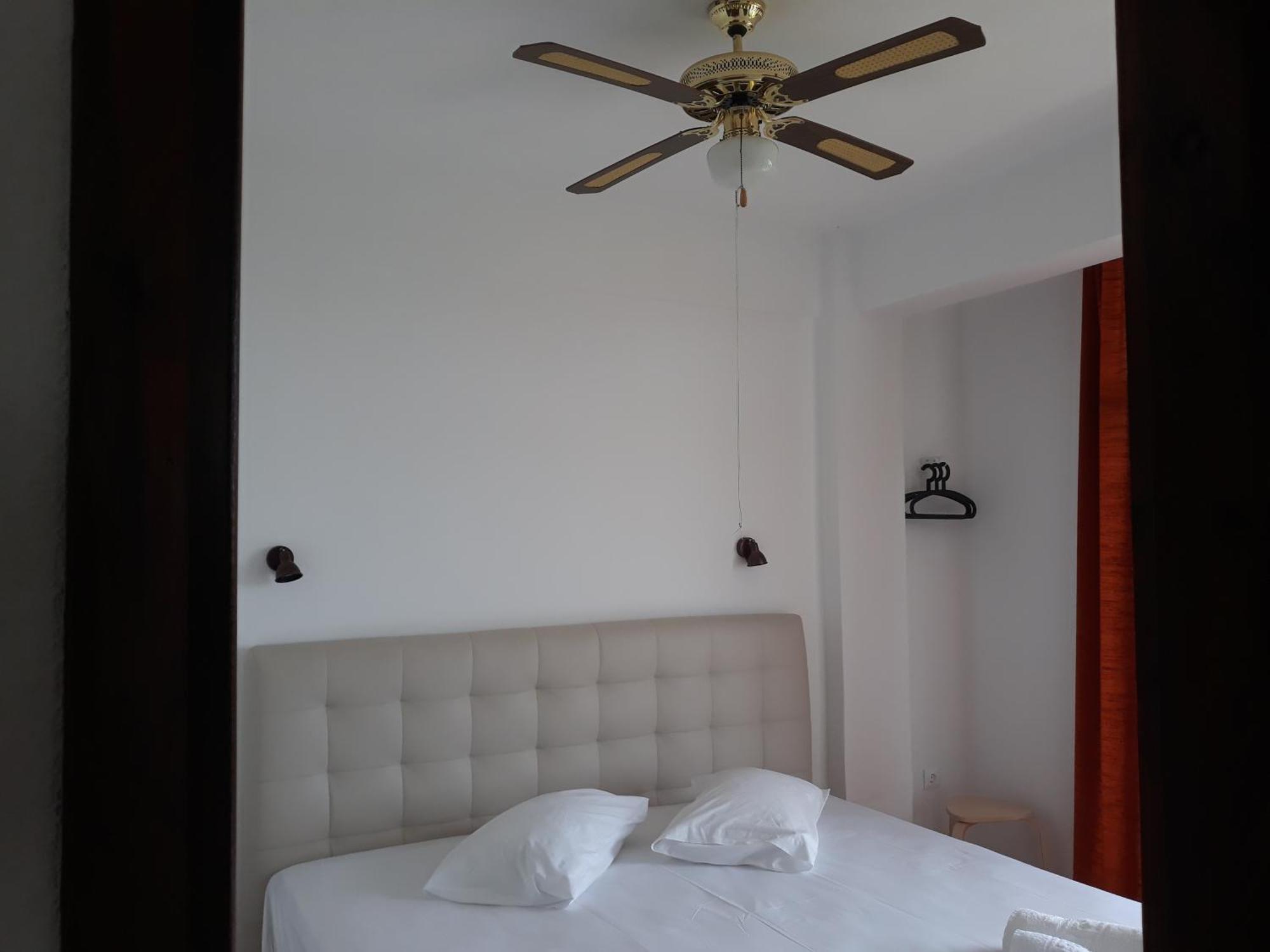 Petradaki Apartments Мола Калива Стая снимка