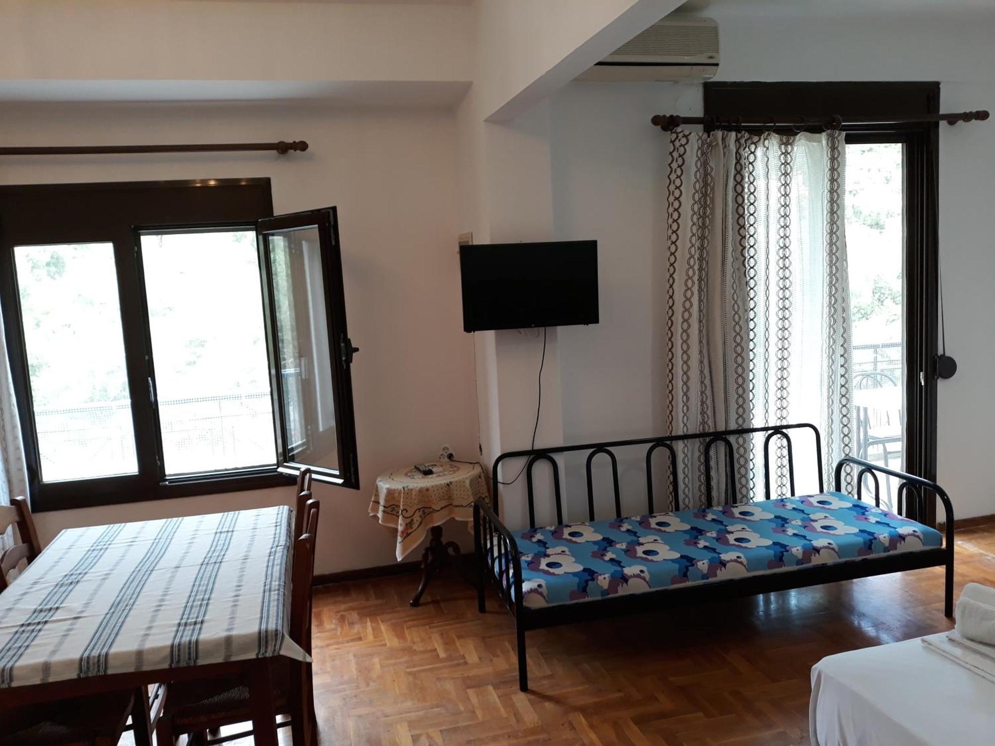 Petradaki Apartments Мола Калива Стая снимка