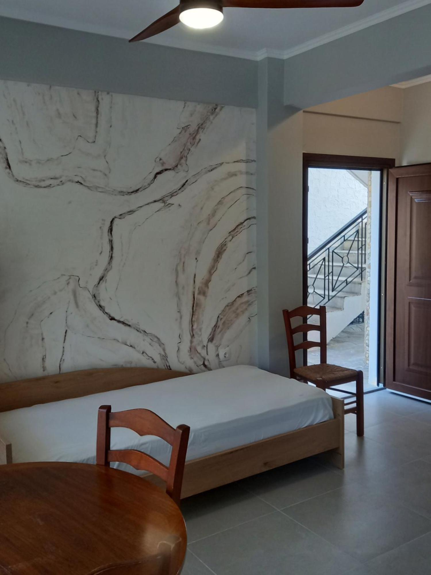 Petradaki Apartments Мола Калива Стая снимка